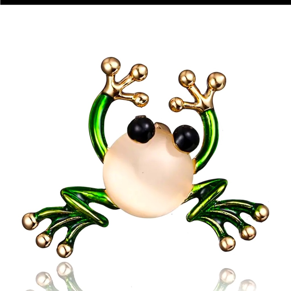 Gold tone frog with green enamel and synthetic opal stone.